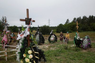 Ukraine's Bucha buries bodies of unidentified victims of Russian occupation