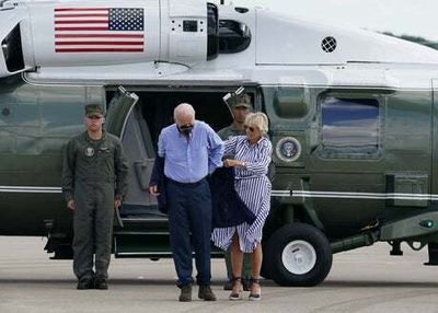 Joe Biden struggles to put on jacket, drops glasses after Kentucky visit