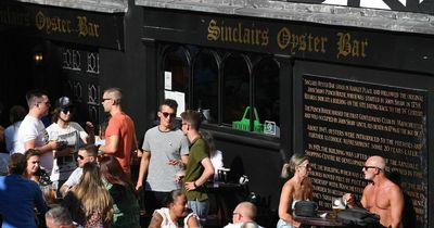 Mancs flock to city centre bars to soak up sun as Met Office issues amber weather warning