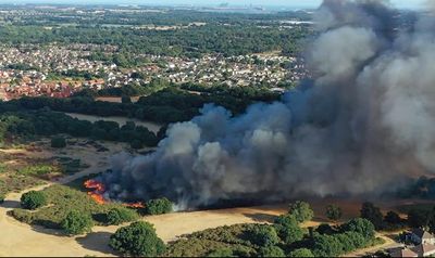 Areas in UK hit by water shortages and grass fires as temperatures start to rise