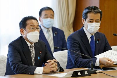 Japan PM to name new Cabinet, shifting some over church ties