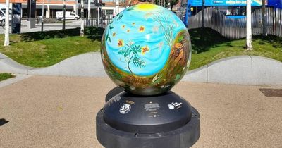 Why these giant globes have appeared at locations around Swansea city centre