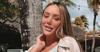 Charlotte Crosby says her bump has 'popped' as she enjoys babymoon