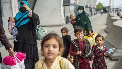 Lawmakers Introduce Bipartisan Afghan Adjustment Act To Help Afghan Evacuees Stay in the U.S.