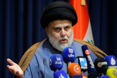 Iraq Shiite cleric behind parliament sit-in steps up demands