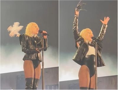 Lady Gaga gets hit in the head with a flying object and carries on performing