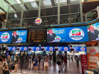 Italy's Berlusconi bids for Senate seat, smothers stations with ads