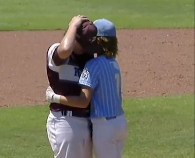 Injured Little League baseball batter wins over crowd after sweetly consoling opponent who hit him