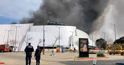Shocking moment shopping centre caves in after bakery fire triggers terrifying explosions