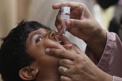 Polio vaccine boosters are offered to London children as the virus spreads