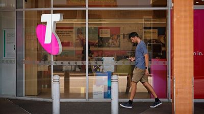 Telstra profit falls but dividend rises, ASX surges after US inflation cools