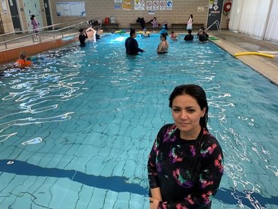 'Freedom, happiness, opportunities': Afghan women learn to swim, drive in Australia