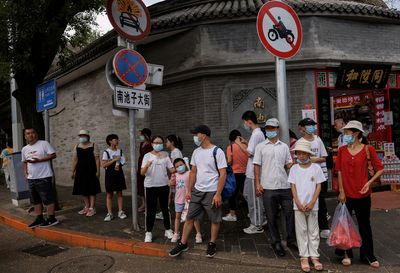 Several cities in China add COVID curbs as millions still under lockdown