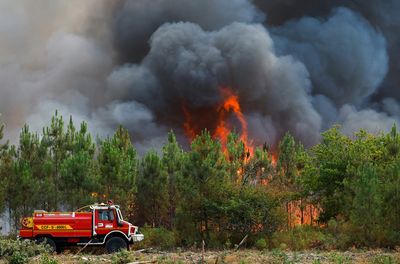France battles 'monster' wildfire as heatwaves scorch Europe