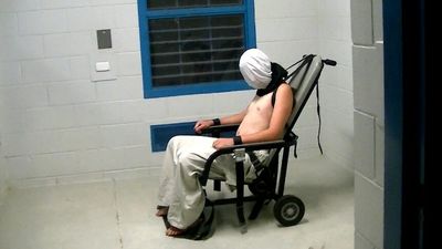The Northern Territory is 'considering' alternatives to spit hoods on kids in police custody, but won't say if they could be banned