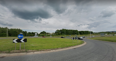 Driver rushed to hospital after lorry overturns closing Scots road for several hours