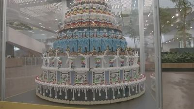 Lego celebrates 90th year with 94,128-piece birthday cake at toy company's hometown