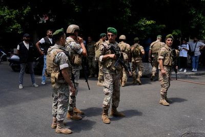 Armed man demanding savings holds Beirut bank staff hostage