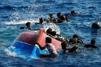 Scenes of desperation as migrant ship sinks during rescue