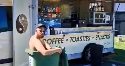 WATCH: Dublin coffee shop owner takes dip in wheelie bin to cool down
