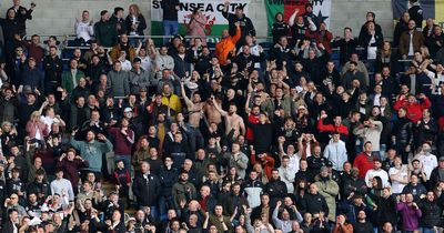 Teen Swansea City fans praised by fellow train commuter who couldn't believe how well they behaved