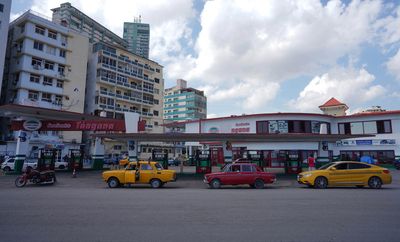 Cuban oil fire all but out, blackouts and gas lines lengthen