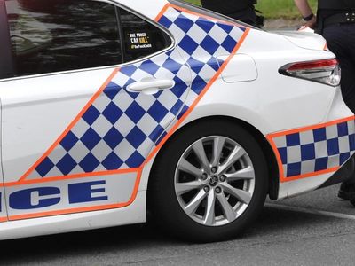 Qld police probe fatal container fire