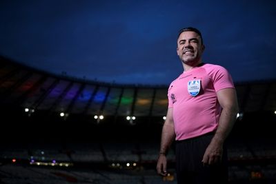 Removing 'camouflage,' Brazil football referee comes out