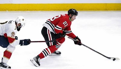 Blackhawks re-sign Caleb Jones, Philipp Kurashev to 1-year contracts