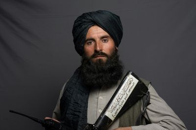 'Happy that infidels are out': Afghan Taliban fighters