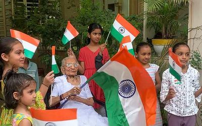 PM Modi's mother distributes national flags, joins 'Har Ghar Tiranga' campaign