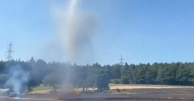 Firefighters spot rare 'dust devil' spinning through countryside as they battle blaze