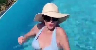 Joan Collins looks incredible at 89 as she dances in St Tropez villa pool after health scare