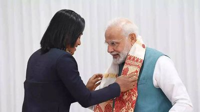 Nikhat Zareen gifts PM Narendra Modi boxing gloves, Hima Das gives traditional gamcha