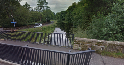 Man dies after getting into difficulty in water in Scots canal