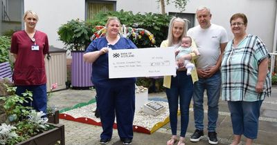 Wishaw General staff receive bumper cheque from couple whose baby spent over 90 days in neonatal unit