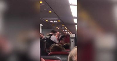 Hero Jet2 passenger restrains woman who stripped and stormed cockpit screaming 'Allahu Akbar'