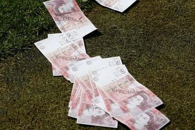 West Ham fans throw fake money at Jesse Lingard during Nottingham Forest clash