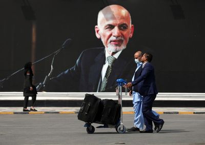 A year on, ex-Afghan leader defends role in Taliban takeover