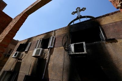 Egyptians mourn 41 killed in Cairo Coptic church fire