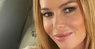 Amanda Holden shares photo of rarely seen daughter as pair cuddle for holiday photo