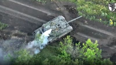 Russian Soldier Abandons Tank And Runs For His Life After Being Shelled By Ukrainian Forces