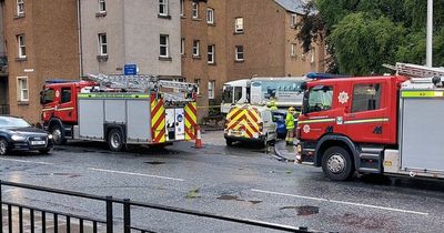 Bin lorry crashes into Edinburgh flats as emergency services rush to scene