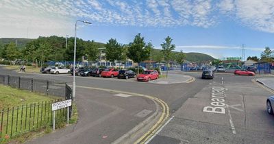 Vehicle makes off from scene after car rammed near West Belfast shops