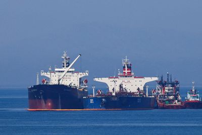 Iran tanker retrieves oil seized by U.S., set to leave Greece