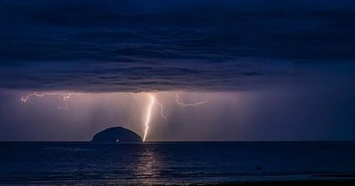 Incredible moment lightning strikes Ailsa Craig with 'direct hit' captured by Scots photographer