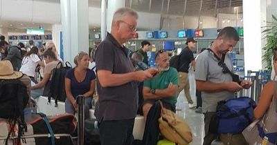 Michael Gove confronted on holiday over Brexit 'lies' by woman in 30-hour airport delay