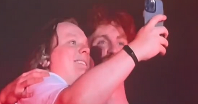 Lewis Capaldi takes Bereal selfie on fans phone live at major music festival