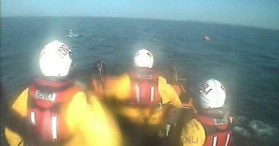 Hovercraft scrambled as kayakers swept out to sea near wind farm