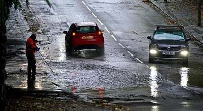 Londoners welcome rainy respite from heatwave
